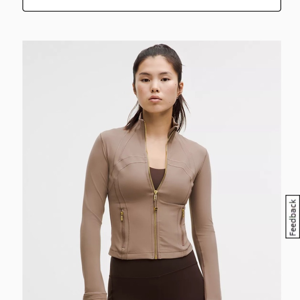 Never worn. Lululemon cropped define jacket.